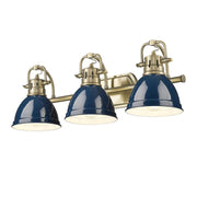 Golden - 3602-BA3 AB-NVY - Three Light Vanity - Duncan - Aged Brass